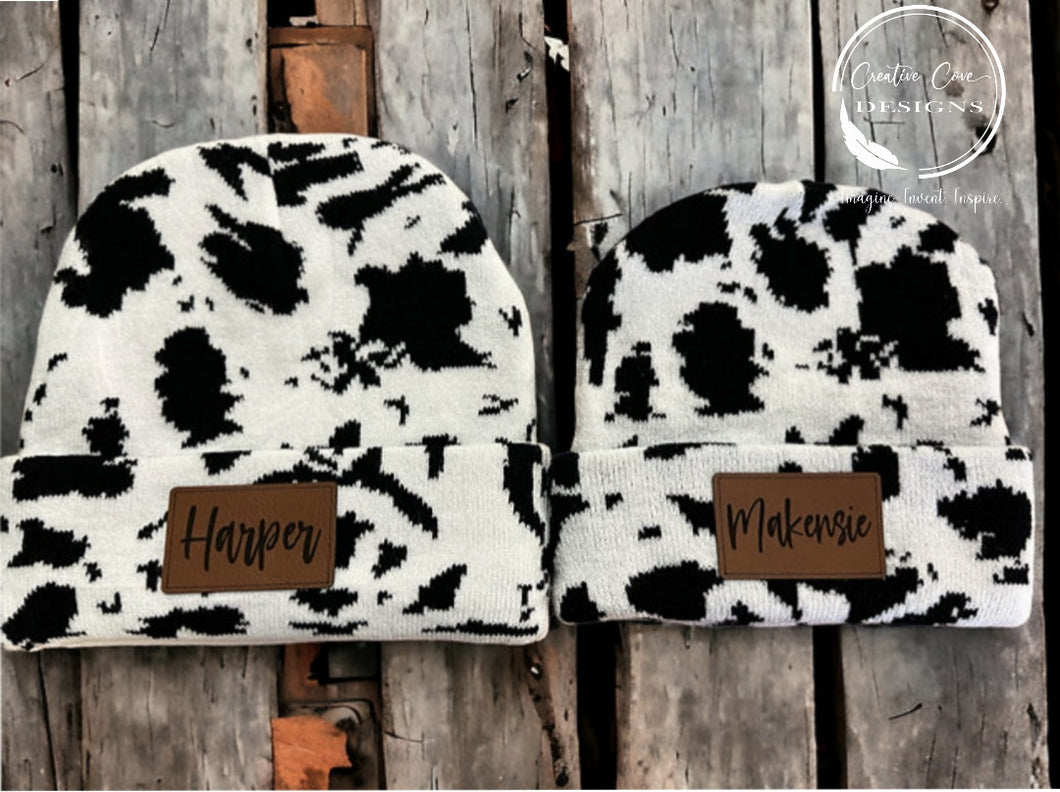 Cowprint beanie with leather patch